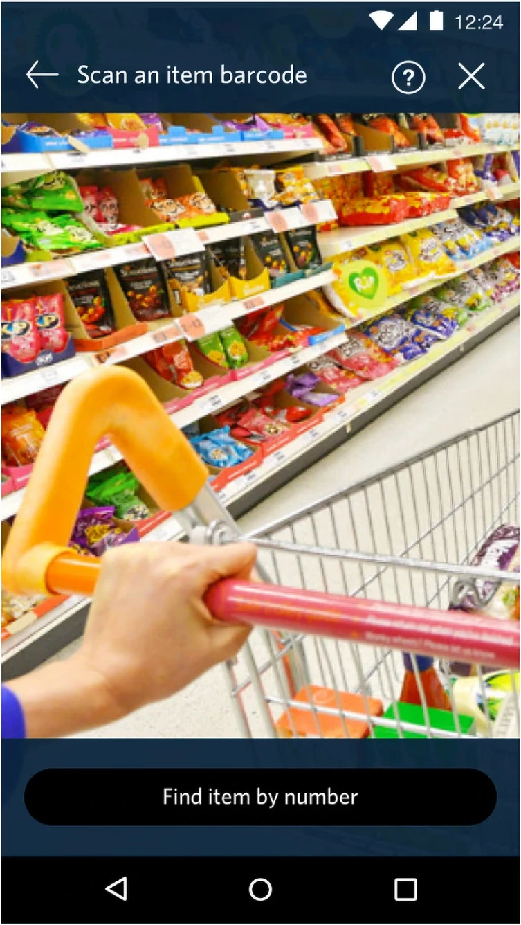 Scan an item barcode screen: the camera viewfinder shows a shopper pushing a cart along a stocked snack aisle, with a Find item by number fallback pinned to the bottom
